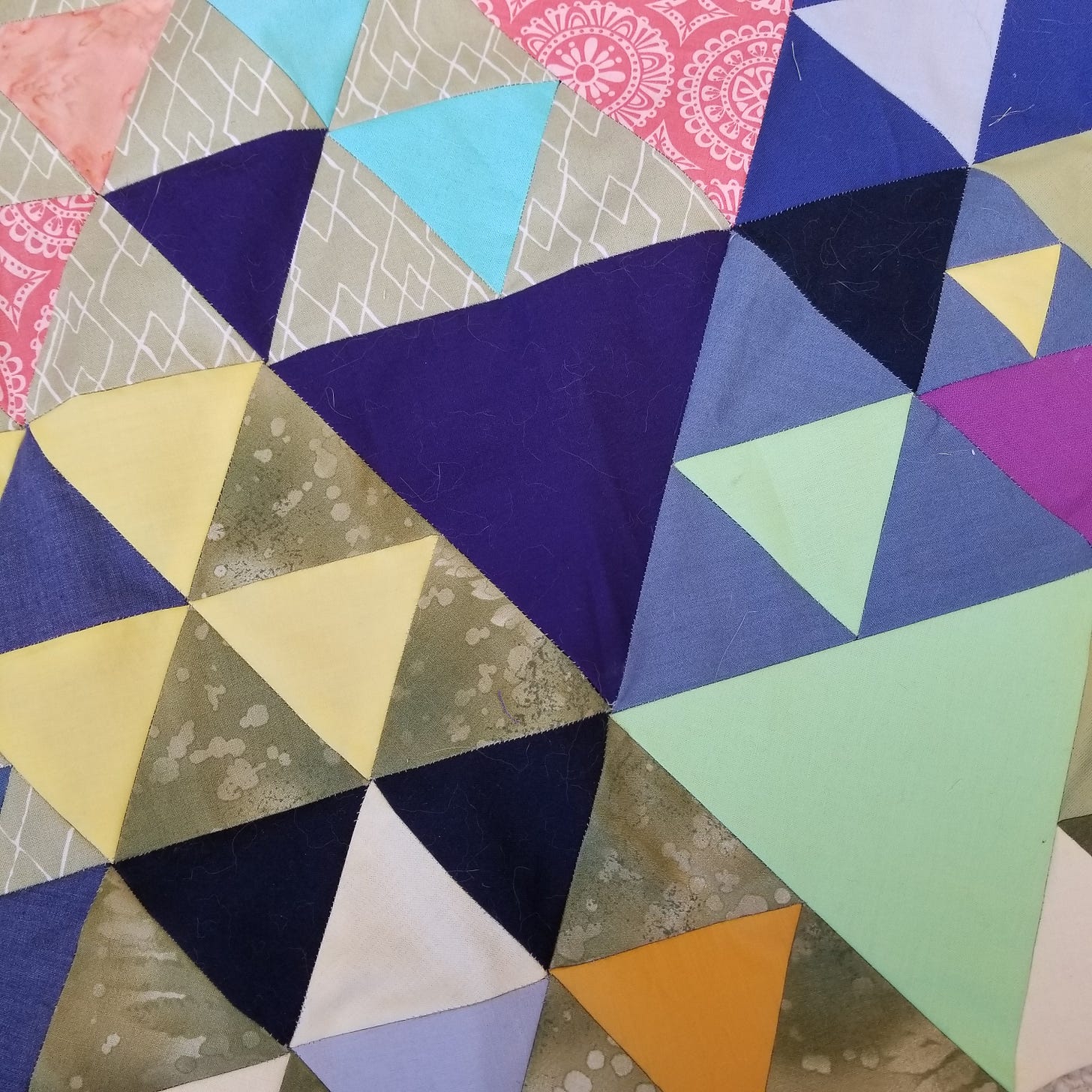 Quilt pic: various sized triangles of different colors