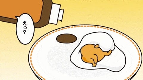 The yolk covering itself with the white - like you would cover yourself with a blanket.