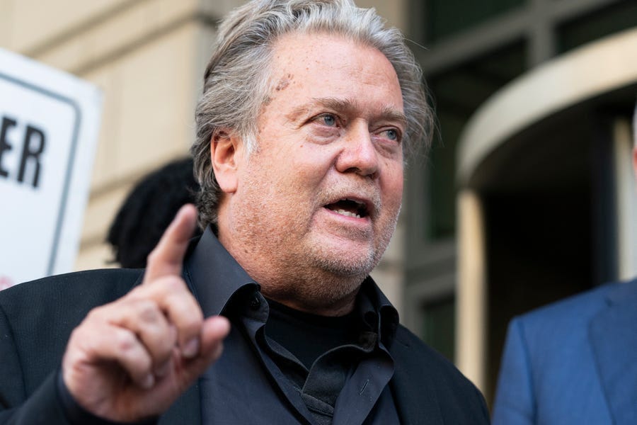 Former White House strategist Steve Bannon speaks with reporters as he departs federal court on Friday, July 22, 2022, in Washington. Bannon, a longtime ally of former President Donald Trump, has been convicted of contempt charges for defying a congressional subpoena from the House committee investigating the Jan. 6 insurrection at the U.S. Capitol.