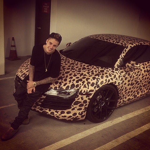Bieber and his leopard car
