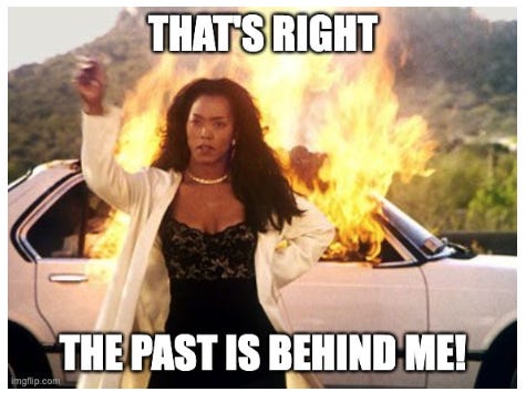 Angela Bassett walks away from a burning car looking confident and sassy.