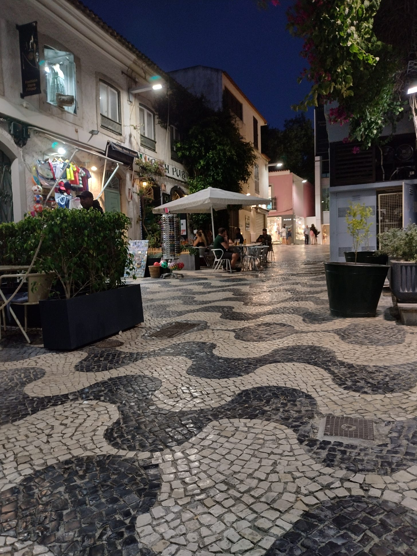 Side street in Cascais at night.
