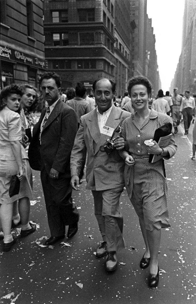 LIFE photographer Alfred Eisenstaedt and a reporter during V-J Day celebrations in Times Square, August 14, 1945.