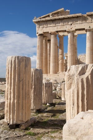 Ruined marble columns in front of Parthenon.jpg