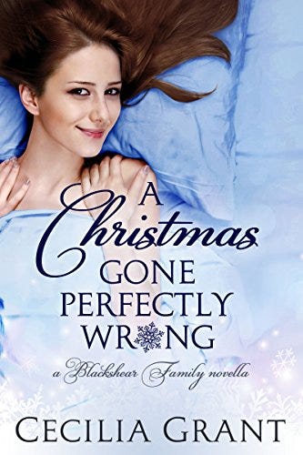 a picture of a brunette young woman lying in a bed of ice-blue sheets, smiling sweetly at the camera. the  title overlaying her reads, "A Christmas Gone Perfectly Wrong." 
