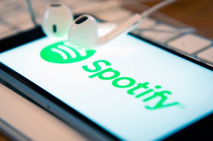 Spotify logo phone headphones 2018 billboard 1548
