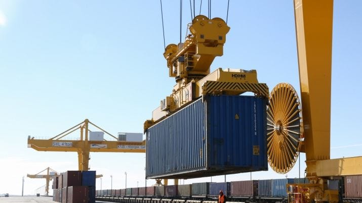 Containers being handled at the Khorgos Gateway dry port on the border of Kazakhstan and China. Image: Khorgos Gateway.