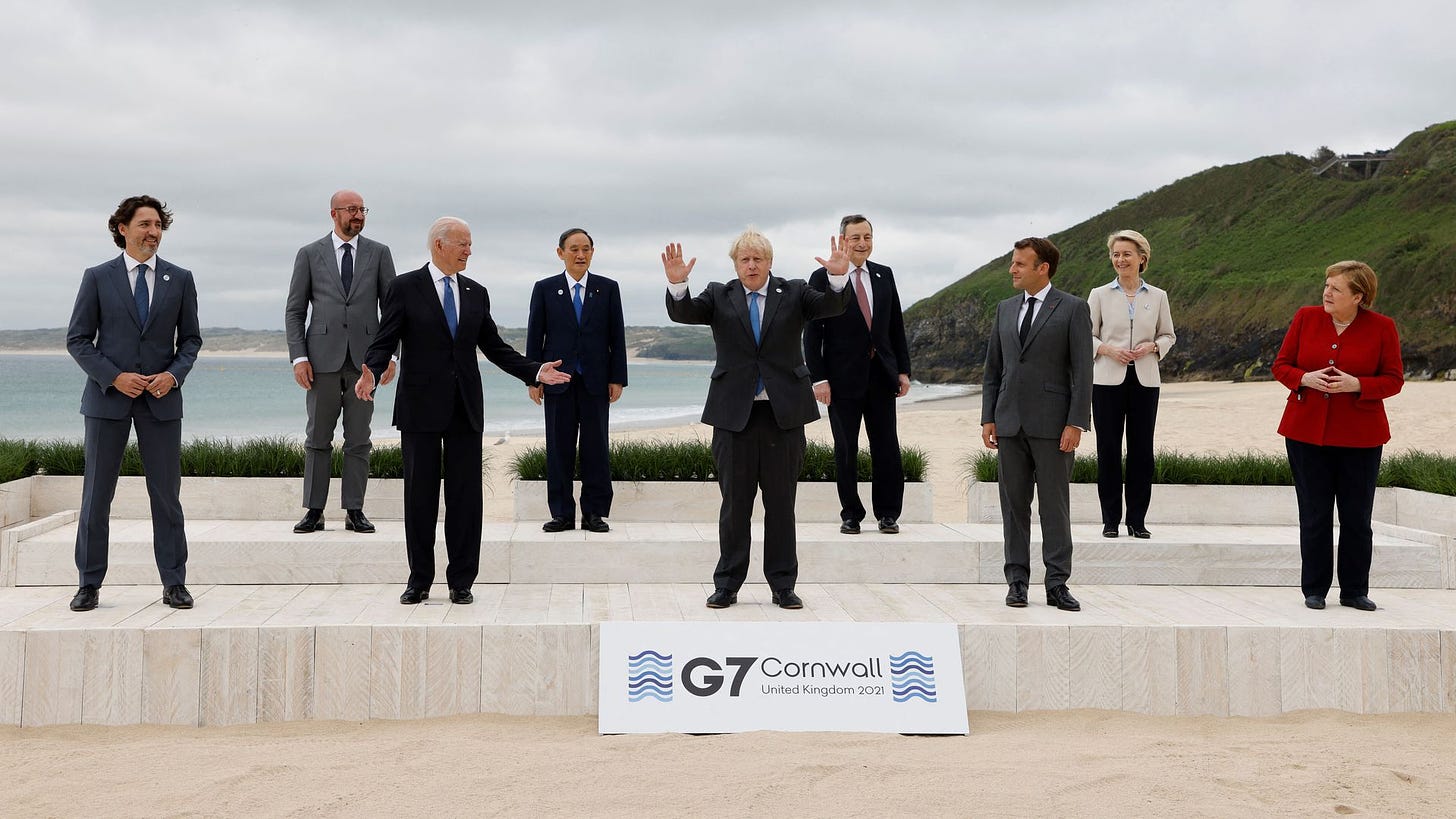 G7 leaders pose for a family photo before the summit. 