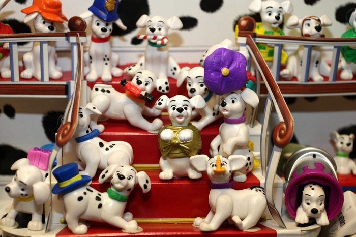 A photos of an excessive amount of McDonald’s toy merchandise particularly a set of dalmation toy dogs