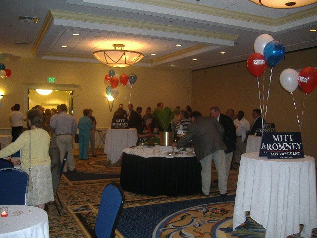 By comparison to the McCain suite, there was quite the crowd in Mitt's. However I think part of this difference is the bar in the far corner of the room, that my second shot is looking toward.