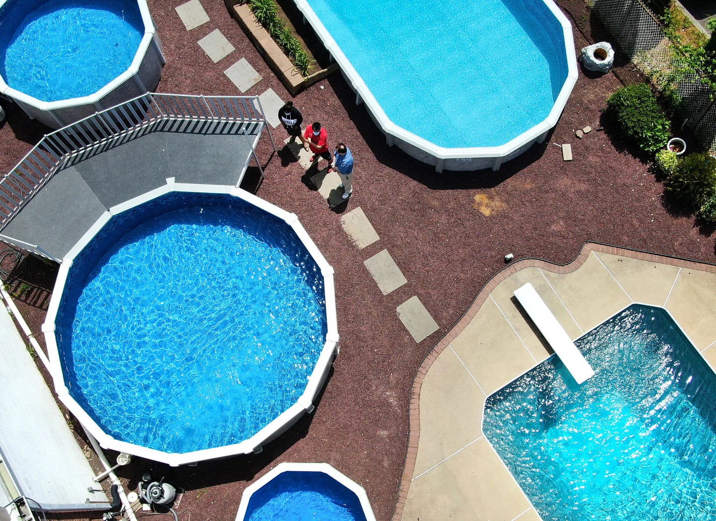 Multiple above-ground pools shot from above. You’ll need to actively manage multiple pools on Osmosis