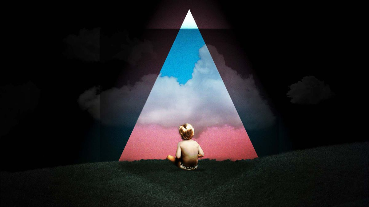 A photo illustration shows a light-skinned infant with light hair sitting in a dark area, facing away from the viewer, looking into a triangle of light with clouds passing through it, with a pink color at the bottom blending into a blue at the top.