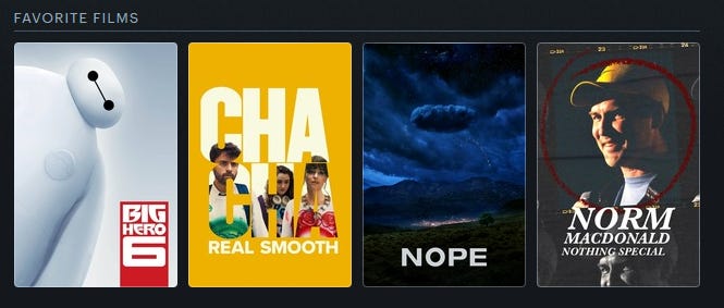 Four movie posters, from left to right: Big Hero 6, Cha Cha Real Smooth, Nope, and Norm MacDonald: Nothing Special.
