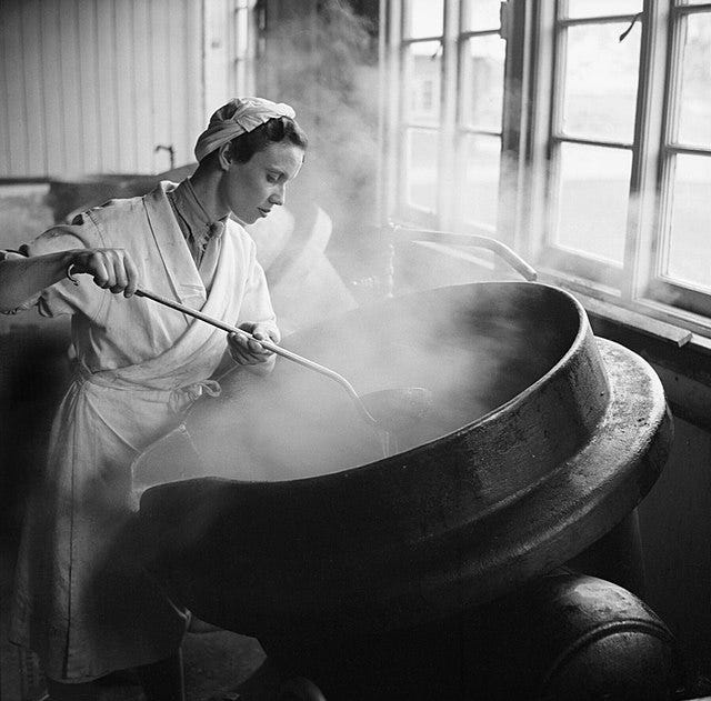 Photograph of a cook stirring a large cauldron, by Sergeant Wooldridge, which Wikimedia Commons assures me is in the public domain