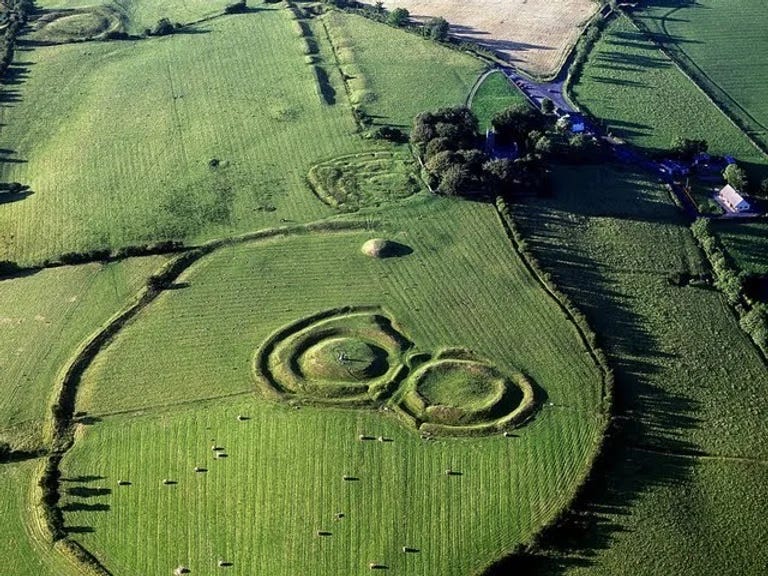 A drone photograph of the site of the Hill of Tara showing the conjoined forts, Mound of Hostages, outer ditch and associated features