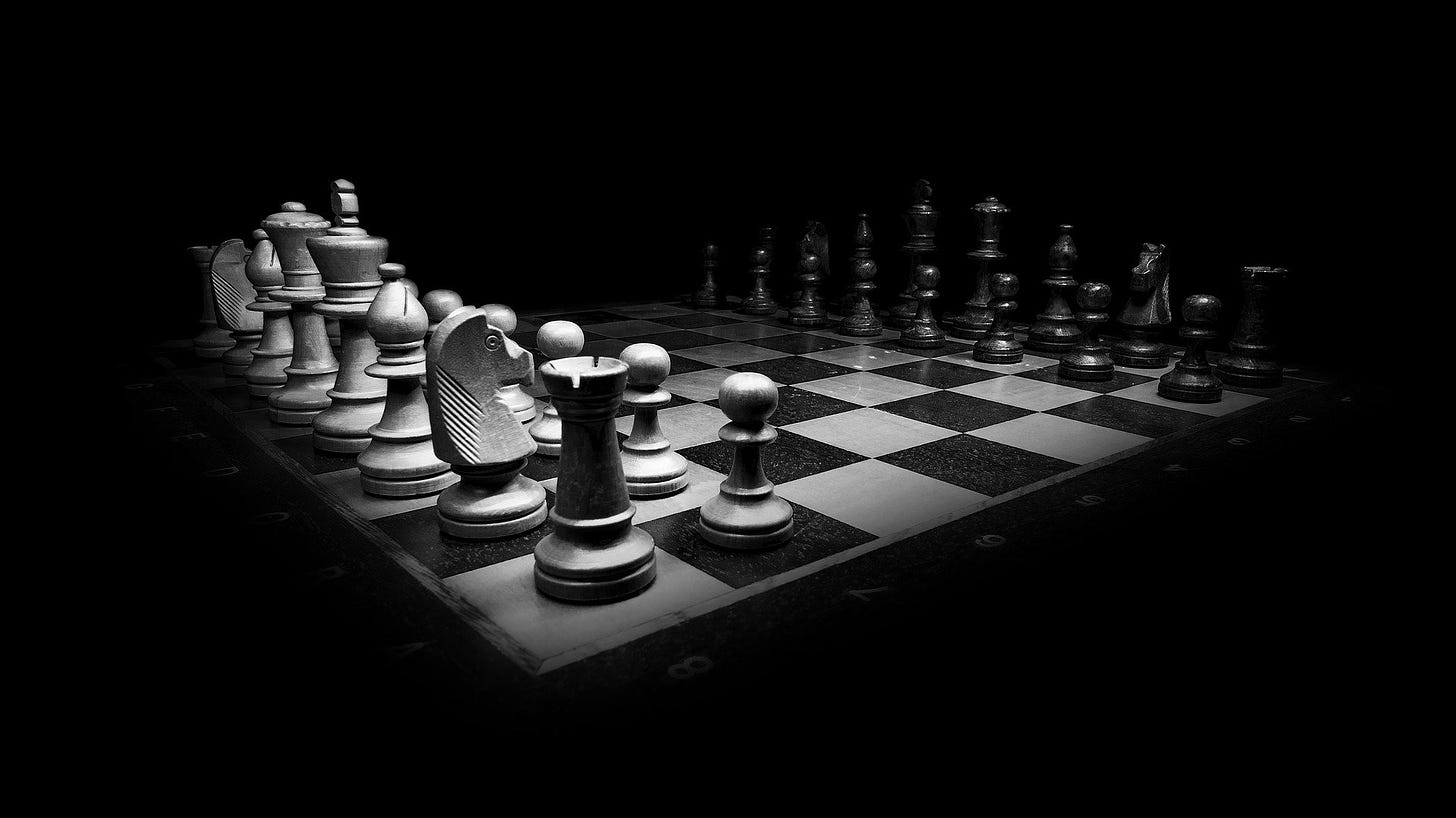 A chess board against a black background