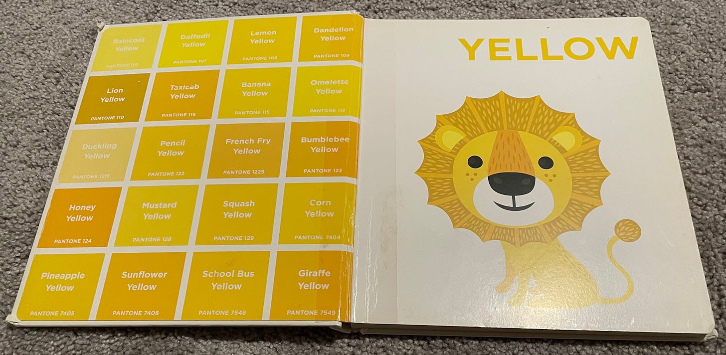 A spread from a book showing color swatches of different shades of yellow and an illustration of a cute lion.