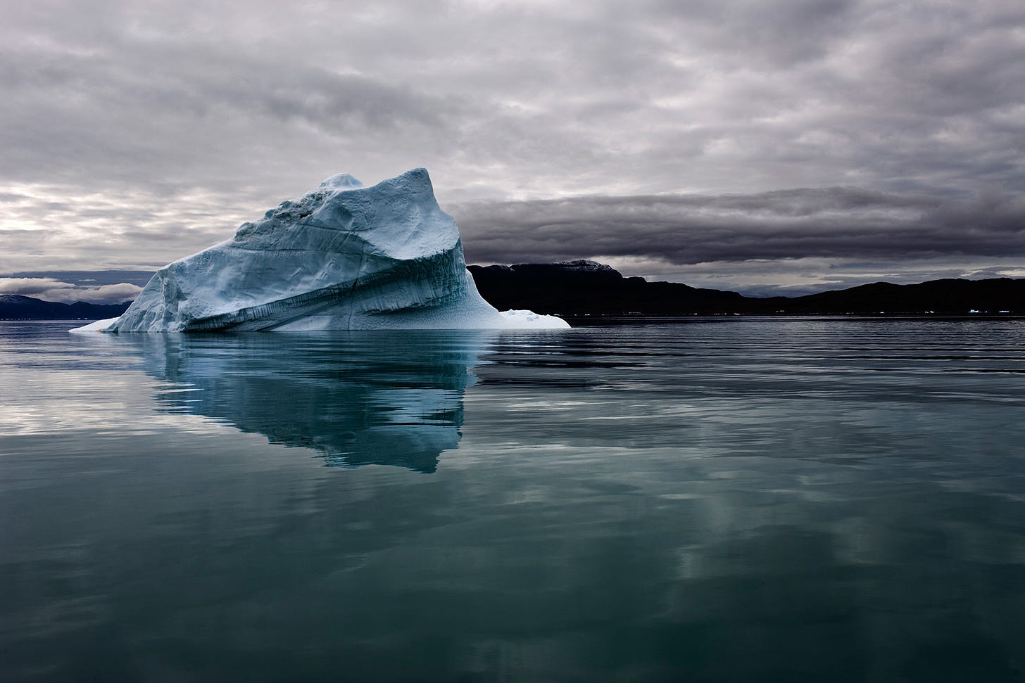 Iceberg in Green Water, Qassiarssuq, Greenland by Camille Seaman ...