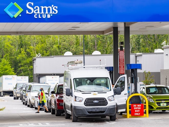 Long lines of cars wait to get gas a Sam's Club in Panama City, Florida, following a cyber attack last week that shutdown a major oil pipeline from Texas to New Jersey. Pennsylvanians might not face gas shortages if the pipeline restarts soon, but a ripple effect from the disruption will most likely drive up prices over the Memorial Day weekend.