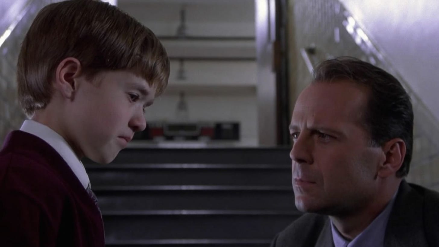 Haley Joel Osment and Bruce Willis in The Sixth Sense