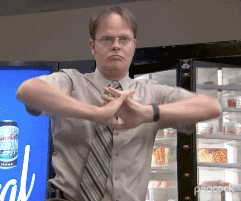 Dwight Schrute from "The Office" stretching