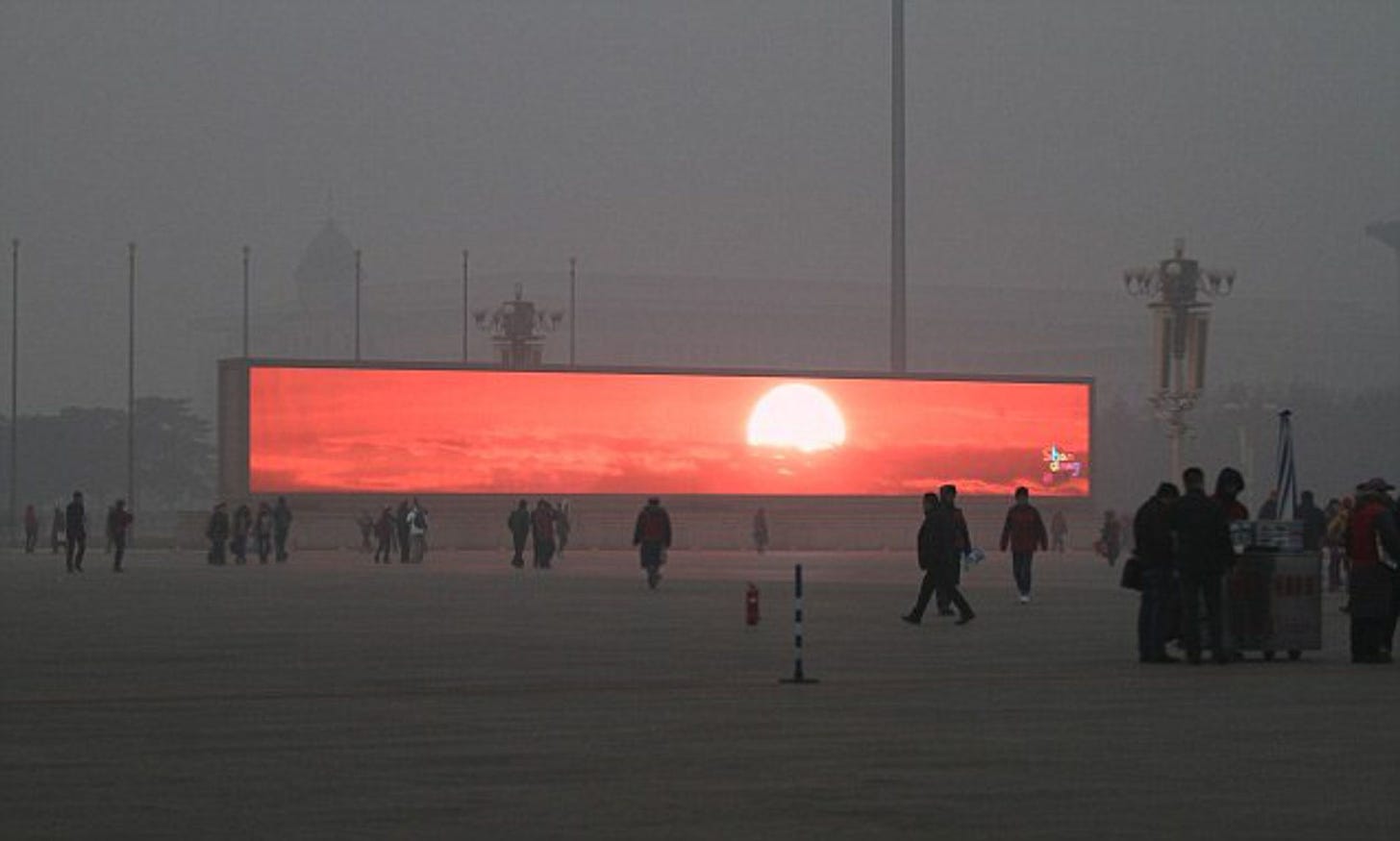 China starts televising the sunrise on giant TV screens because Beijing is  so clouded in smog | Daily Mail Online