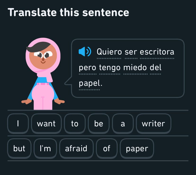 Screenshot of DuoLingo screen with a sentence in Spanish translated to "I want to be a writer by I am afraid of paper."