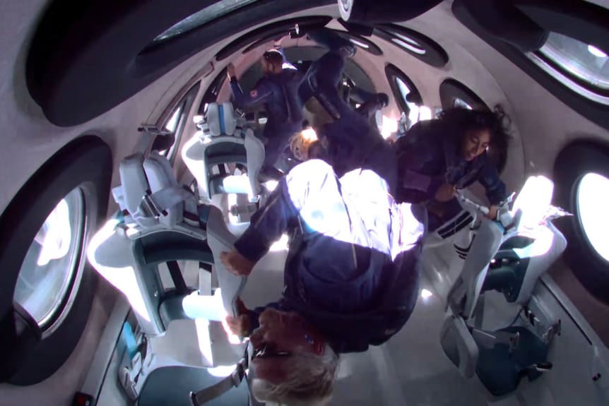 Crew on the Virgin Galactic space flight experience zero gravity.