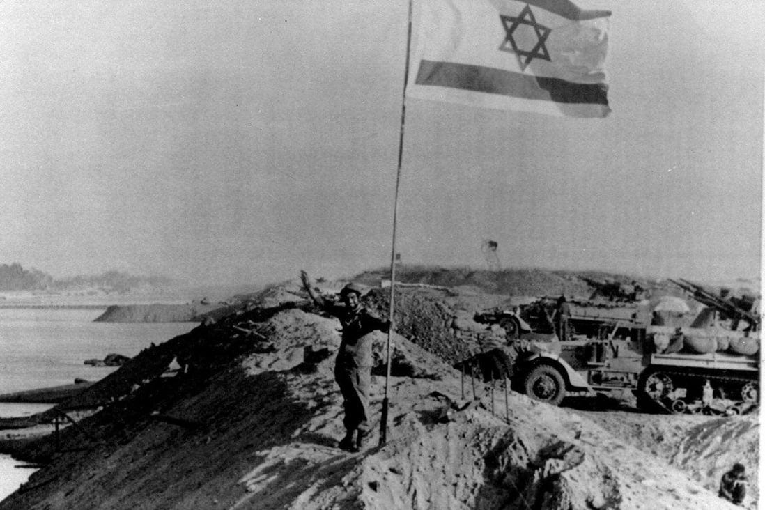 A Star of David flag on the recaptured east bank of the Suez Canal on October 30, 1973, at the end of the Yom Kippur war. Photo: AP
