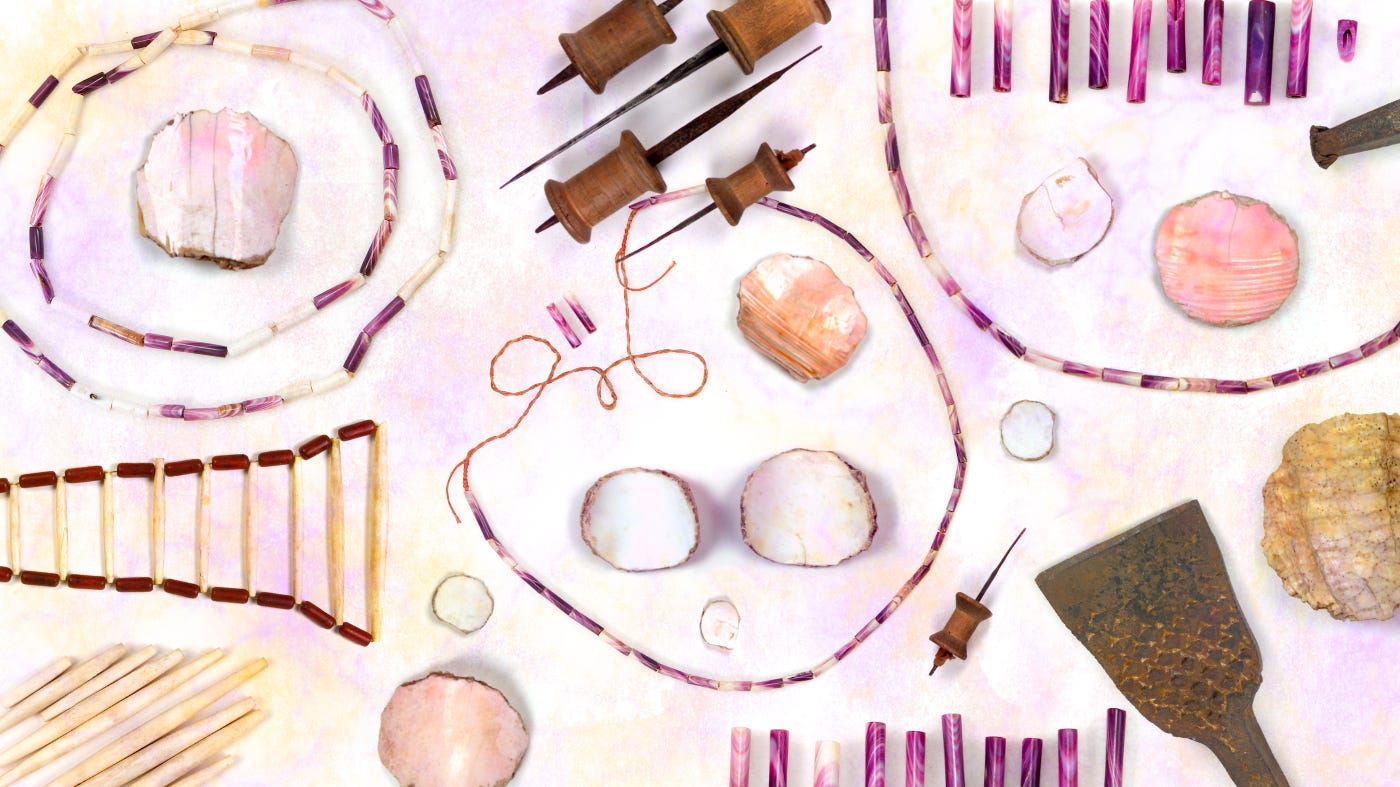 A photo illustration of various tools and supplies for making wampum, a Native technology of shell beads that Amelia argues was a kind of distributed ledger. Shells, and what look like necklaces, and metal tools for shaping them, are arranged here.