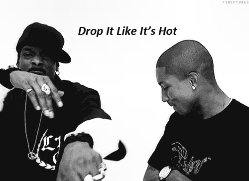 A GIF of snoop dogg and Pharell in the drop it like its hot music video
