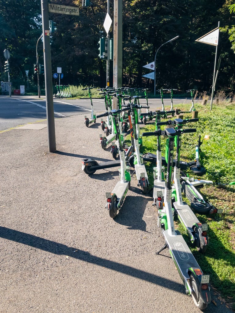"Lime electric scooters in Cologne, Germany" by dronepicr is licensed under CC BY 2.0