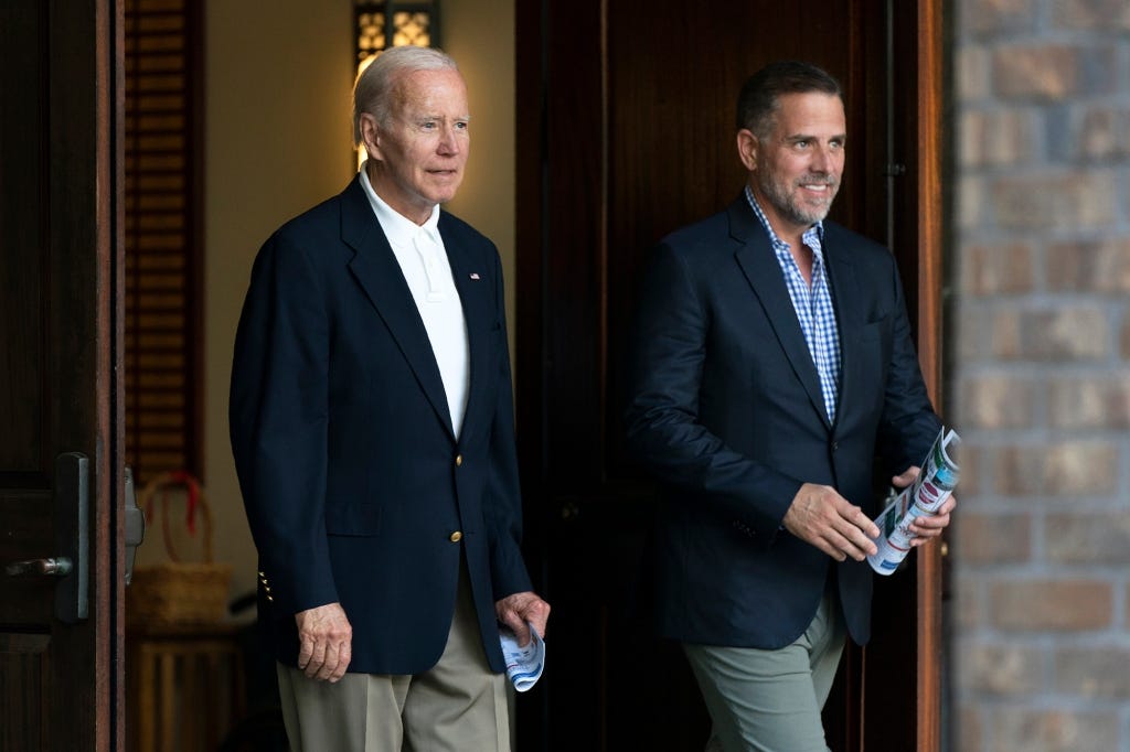 President Joe Biden alongside his embattled son Hunter in Aug. 2022.
