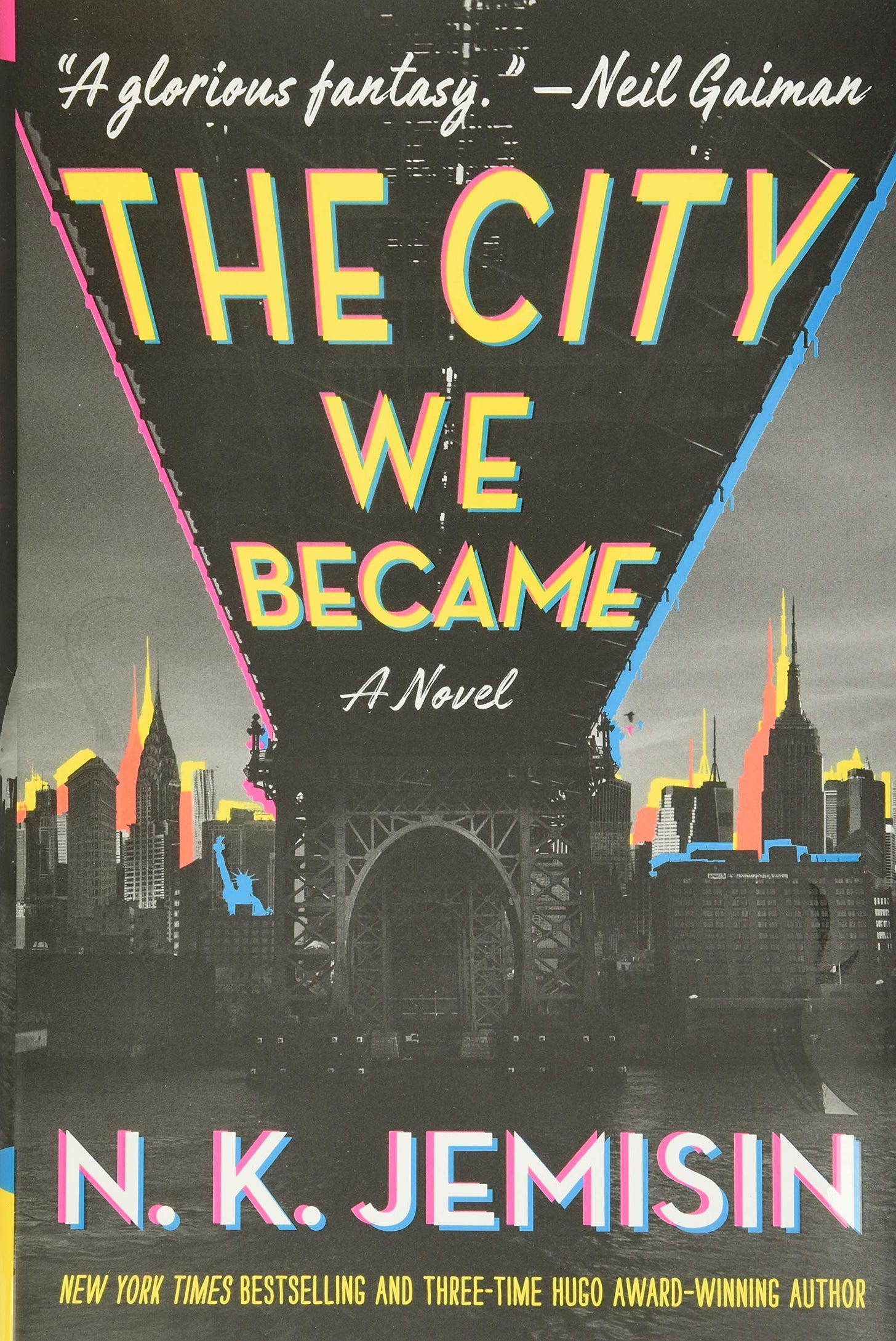 The cover of "The City We Became" which includes an image of New York City from under a bridge, with everything black and white and the edges color-shifted to have yellow features with pink and blue around the edges.