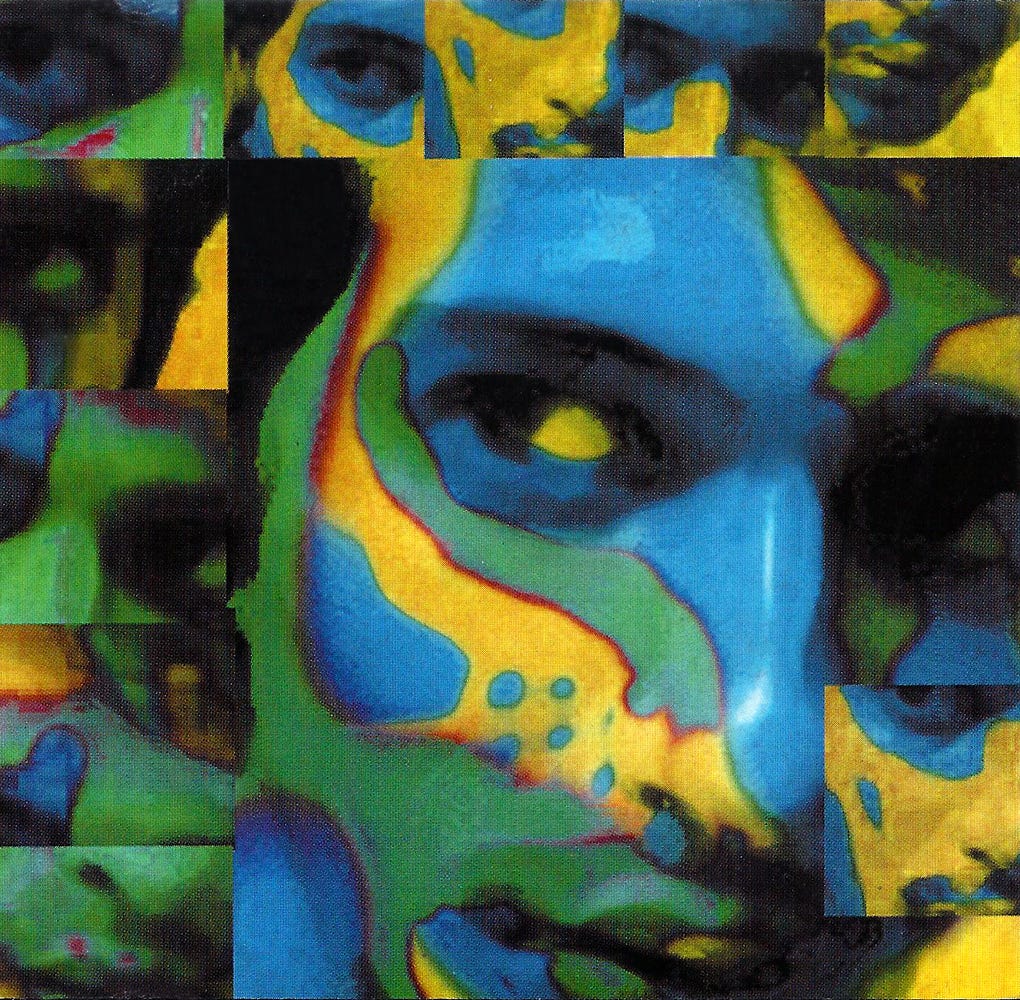 Image of the artwork that was on the cover of Chaina Bhabish, with a close up of Arnob’s face coloured blue with sashes of yellow with red borders going across his cheeks and other areas.