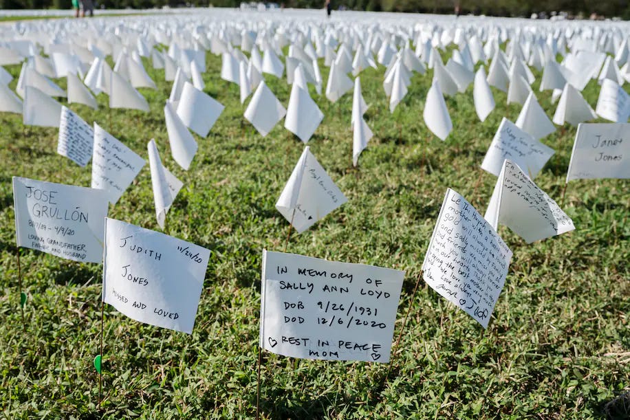 A detail of the flags in which you can see writing on some of them.