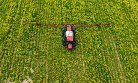 US-AGRICULTURE<br>A farmer spreads pesticide on a field in Centreville, Maryland, on April 25, 2022. (Photo by Jim WATSON / AFP) (Photo by JIM WATSON/AFP via Getty Images)
