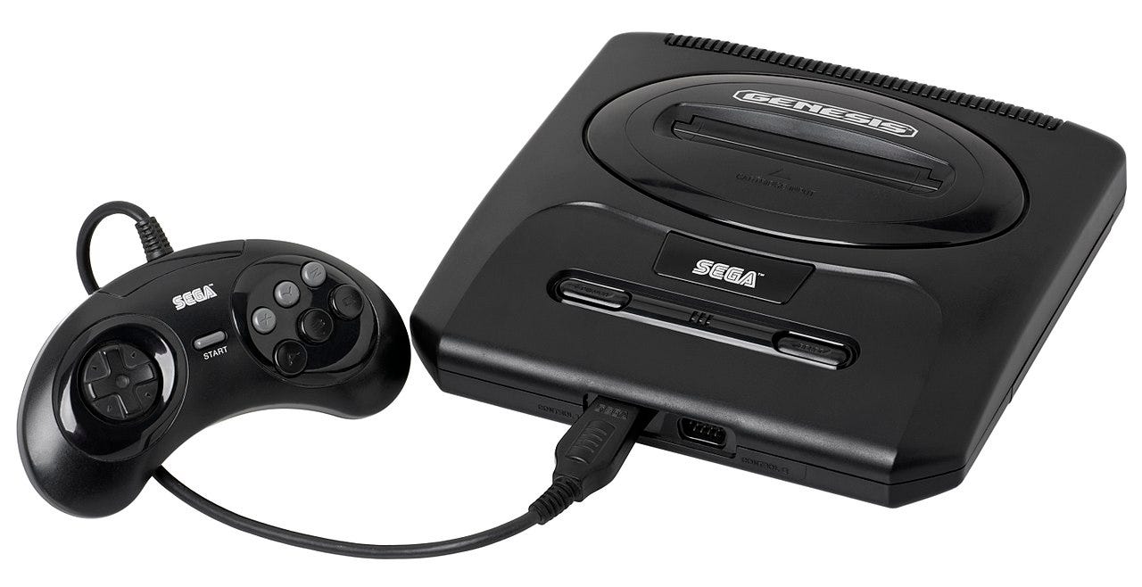 A Model-2 Sega Genesis, with the 6-button "arcade" gamepad attached.