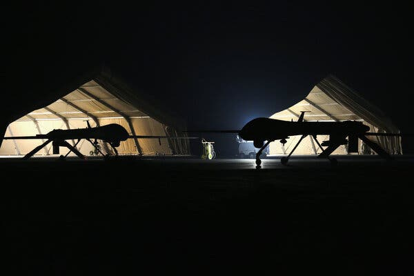 An Air Force Predator drone, right, returning from a mission in the Persian Gulf region in 2016. The new policy suggests that the United States intends to launch fewer drone strikes away from recognized war zones.