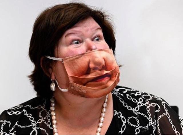 Maggie De Block (Minister of Health Belgium) wearing a mask like this :  r/pics
