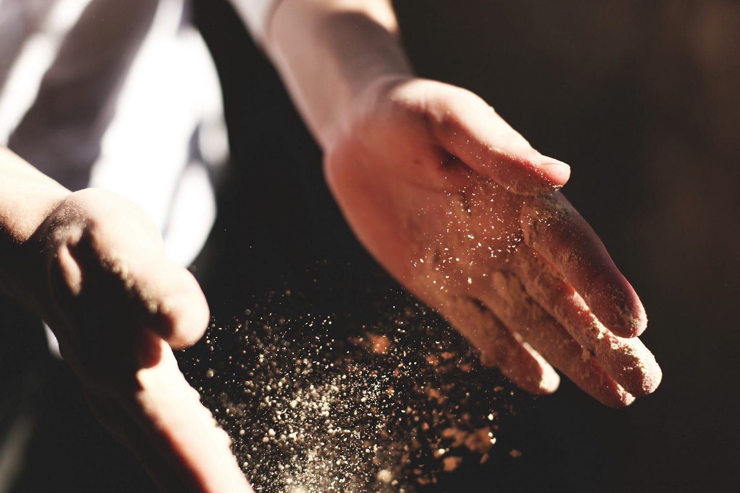 Image of a man’s hands clapping for article by Larry G. Maguire