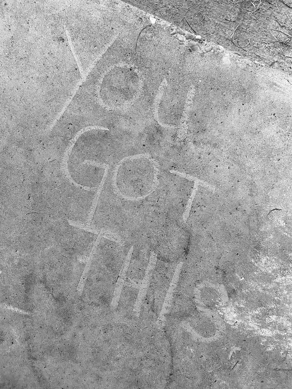 black and white photo - "you got this" written by chalk on concrete