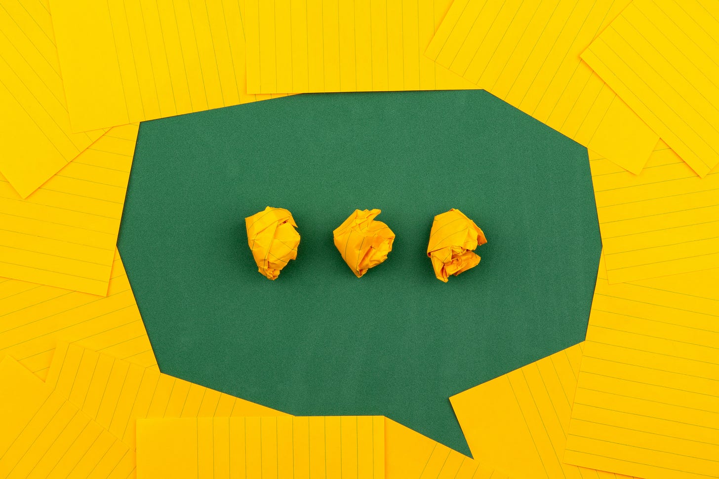 Photo illustration of a green and yellow speech bubble(Volodymyr Hryshchenko on Unsplash)