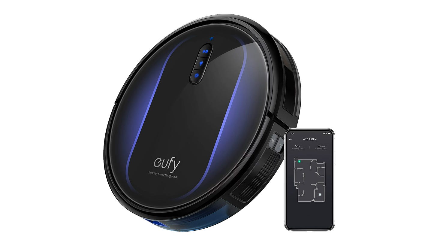 Eufy RoboVac G32 and a smartphone on a white background
