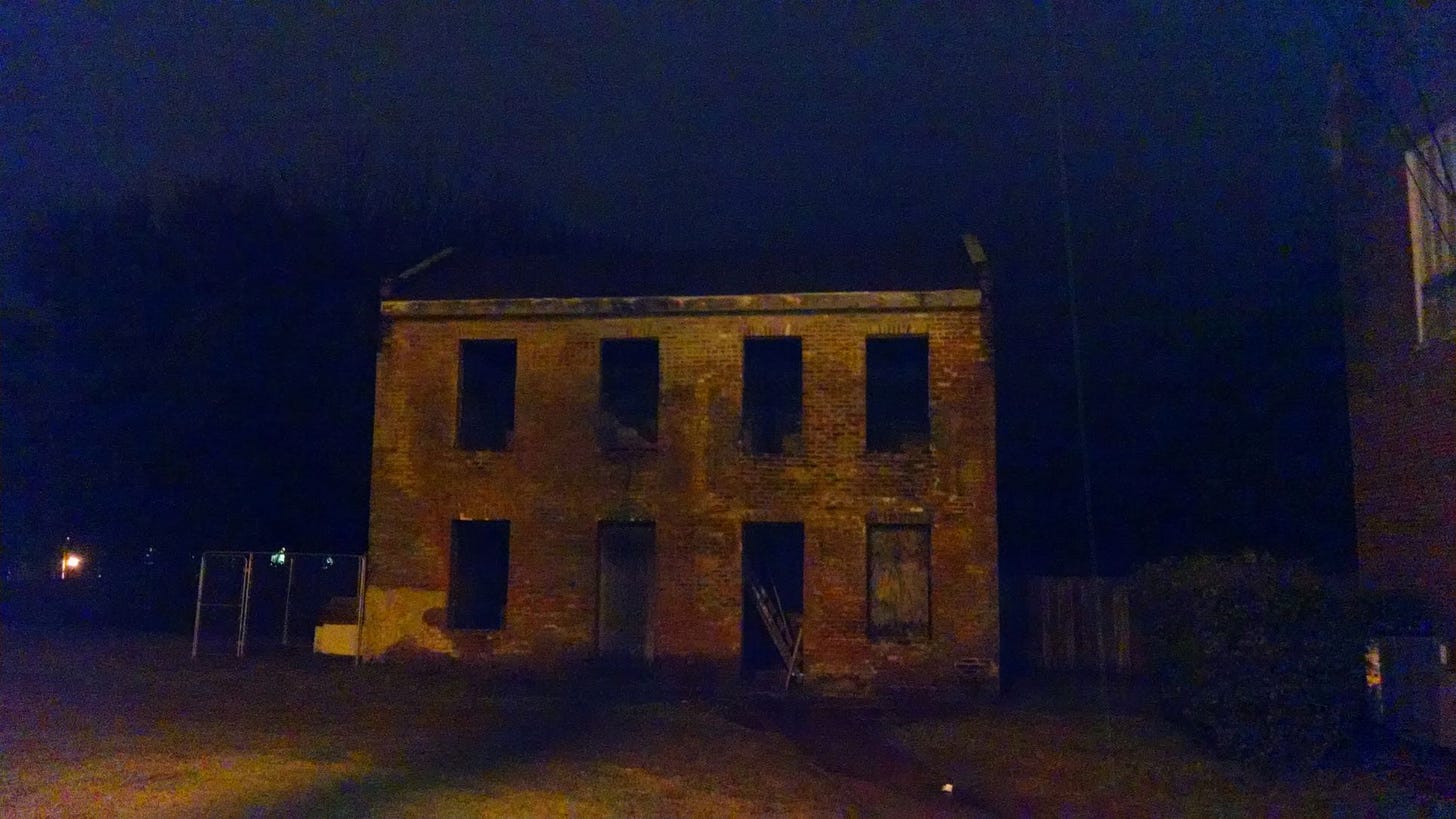 an abandoned building at night