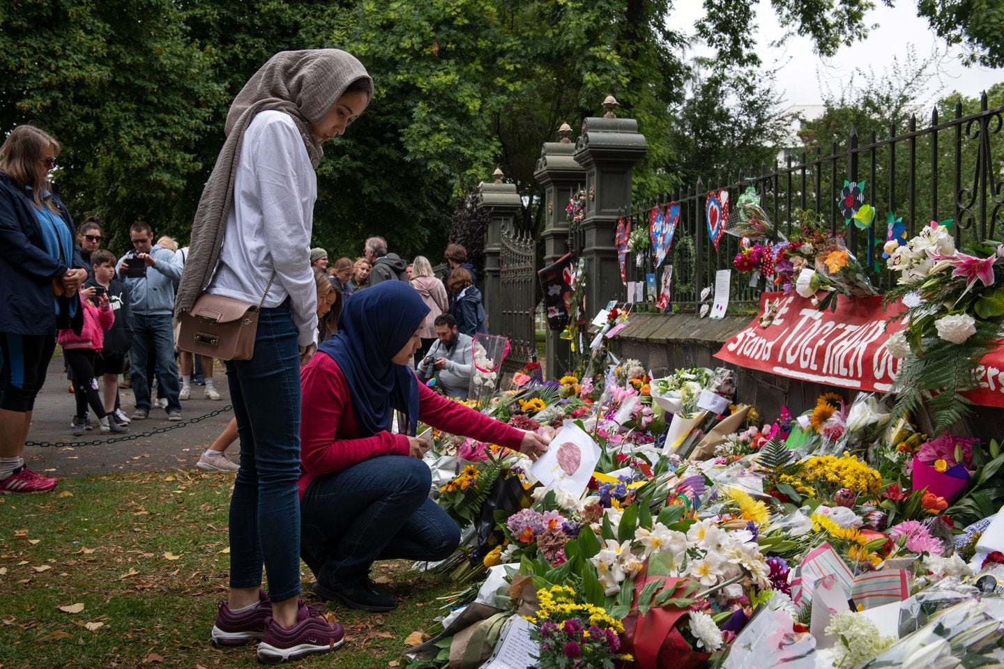 A makeshift memorial to the victims of the mosque massacre in Christchurch, New Zealand, in 2019. A planned Hollywood film about the mass shootings has drawn a sharp backlash in New Zealand, with Muslims denouncing the director's decision to focus not on the community's pain and resilience, but instead on the response by Prime Minister Jacinda Ardern.