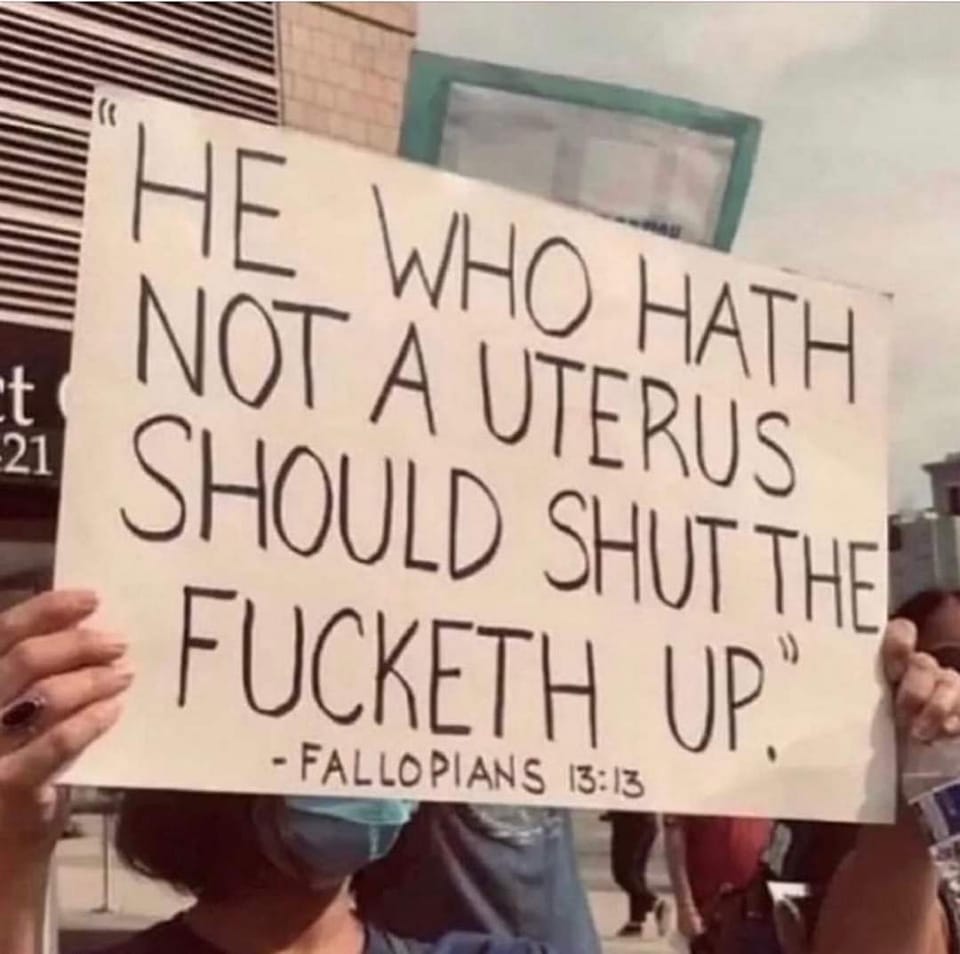 May be an image of 1 person and text that says 'He t NOT A 21 SHOULD WHO UTERUS SHUT THE FUCKETH -FALLOPIANS 13:13 UP."'