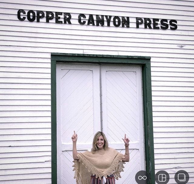 Here's me in the poncho my Aunt Marguerite knit for me celebrating the day. 