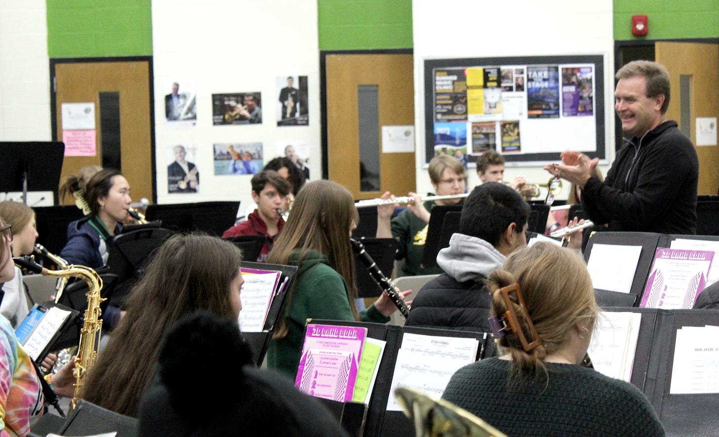 Joe Finnegan teaches students at D.C. Everest Senior High School music. Students from the facility and several others are performing at the Rose Parade in California Monday. It was covered by Evan J. Pretzer in The Wausau Sentinel. 