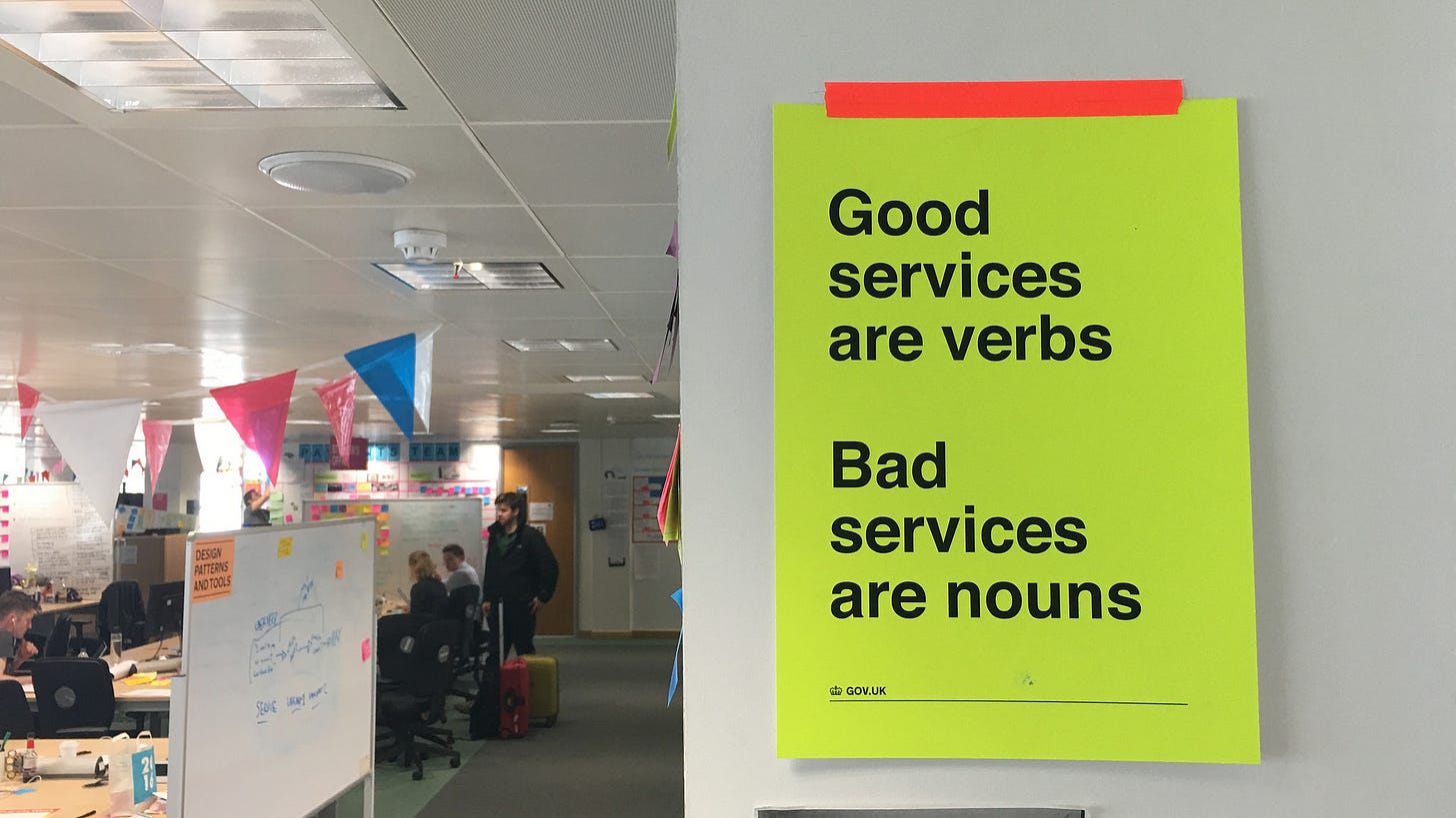Poster hanging in office that says, "Good services are verbs. Bad services are nouns.